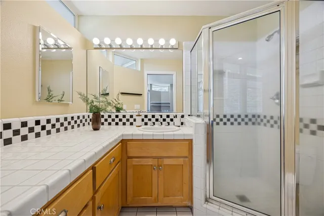 a view of balcony with wooden floor and fence