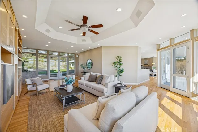 a large kitchen with a table and chairs