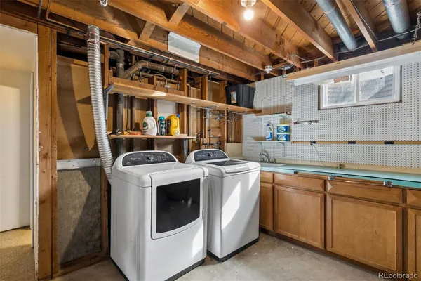 a utility room with dryer and washer