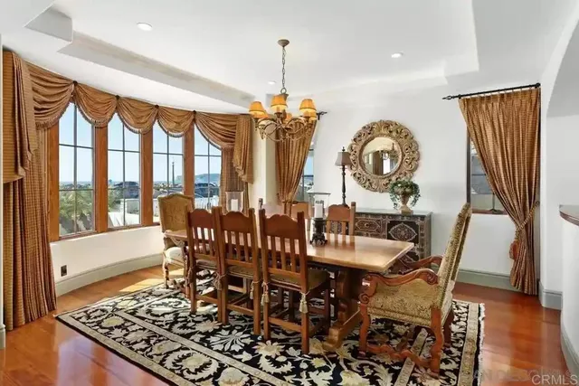 a view of a balcony with chairs