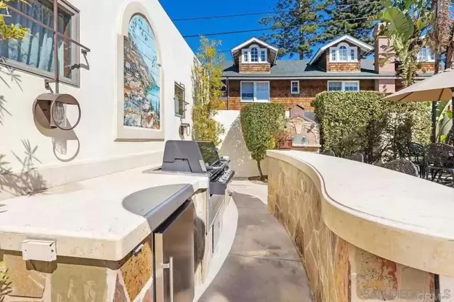 a bedroom with a large bed and a large window