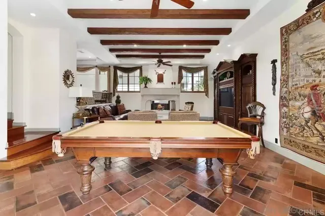 an outdoor space with furniture and umbrella