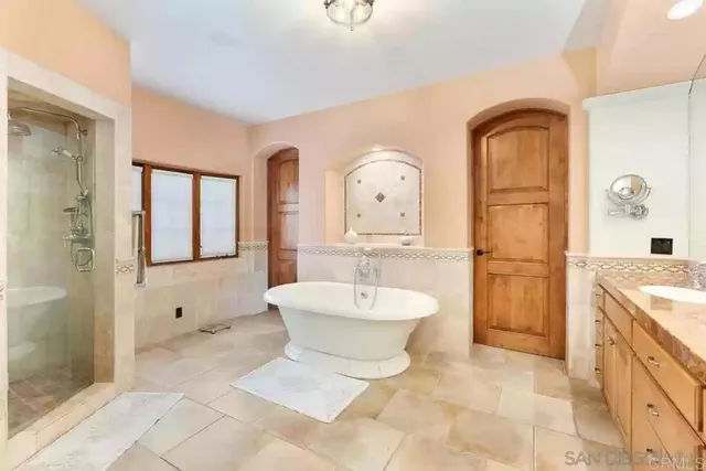 a view of a lake with couches and city view