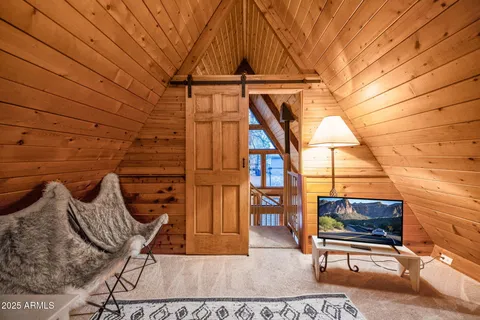 a view of wooden deck with a small yard