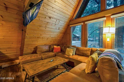 a blue bench sitting in front of a building