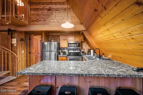 a view of a house with a iron stairs