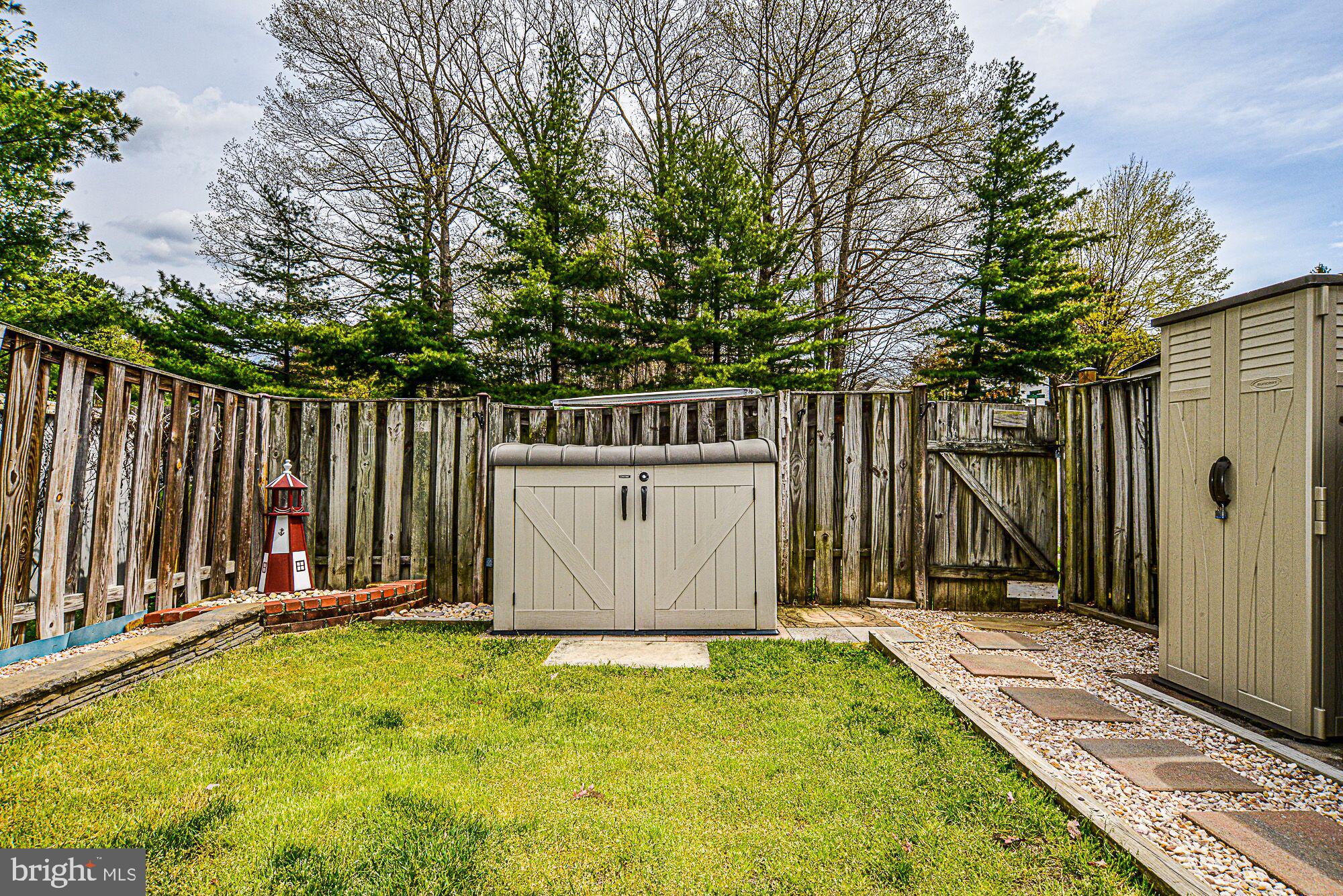 7728 Matisse Way Springfield, VA 22153 - Photo 15 of 20 Large Fully Fenced in Backyard with Storage