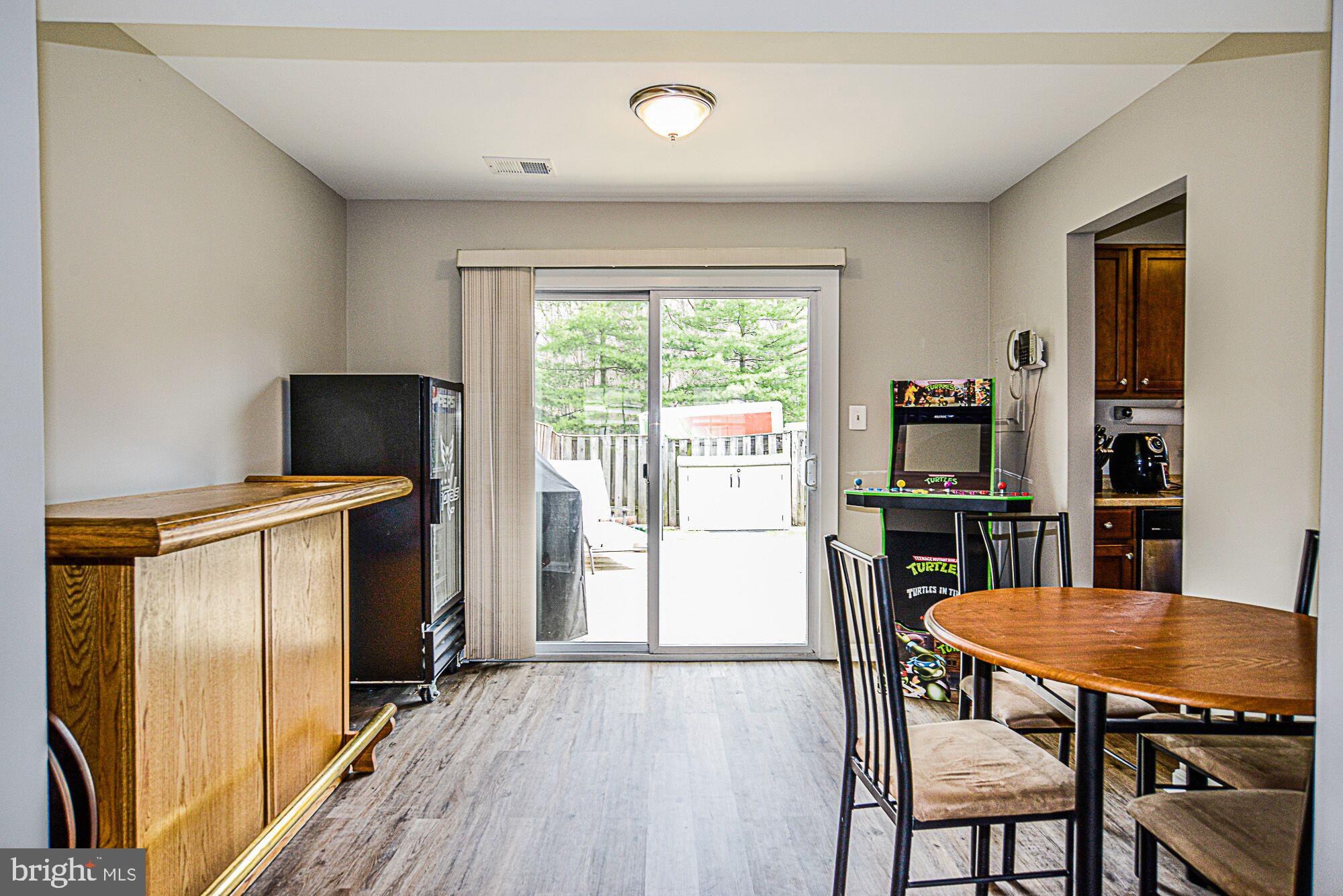 7728 Matisse Way Springfield, VA 22153 - Photo 7 of 20 Dining Room with Sliding Glass door to outside