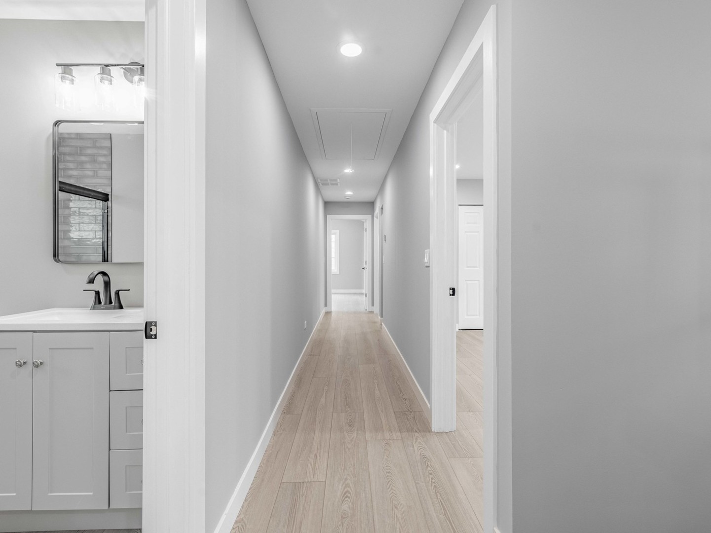 3548 Clinton Avenue Berwyn, IL 60402 - Photo 17 of 49 a view of a hallway with wooden floor and staircase