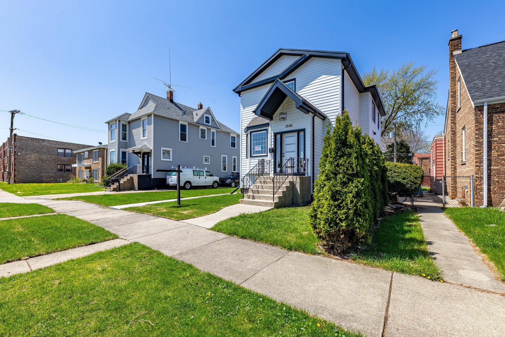 3548 Clinton Avenue Berwyn, IL 60402 - Photo 2 of 49 a front view of house with yard and green space
