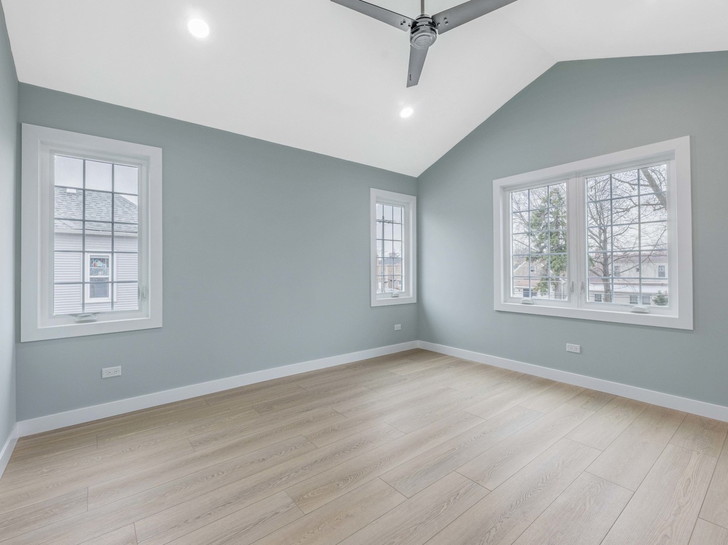 3548 Clinton Avenue Berwyn, IL 60402 - Photo 25 of 49 a view of an empty room with a window and wooden floor
