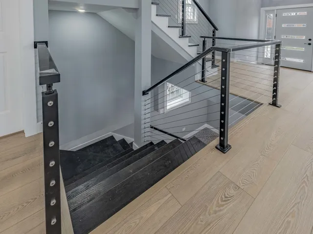 a room with equipment and wooden floor