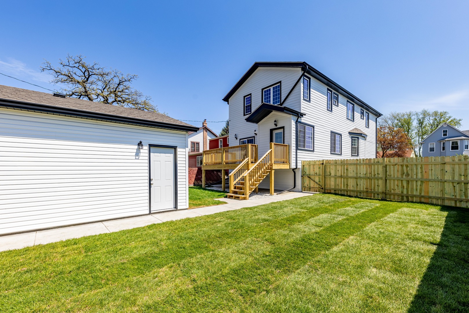3548 Clinton Avenue Berwyn, IL 60402 - Photo 49 of 49 a view of a house with a yard and sitting area