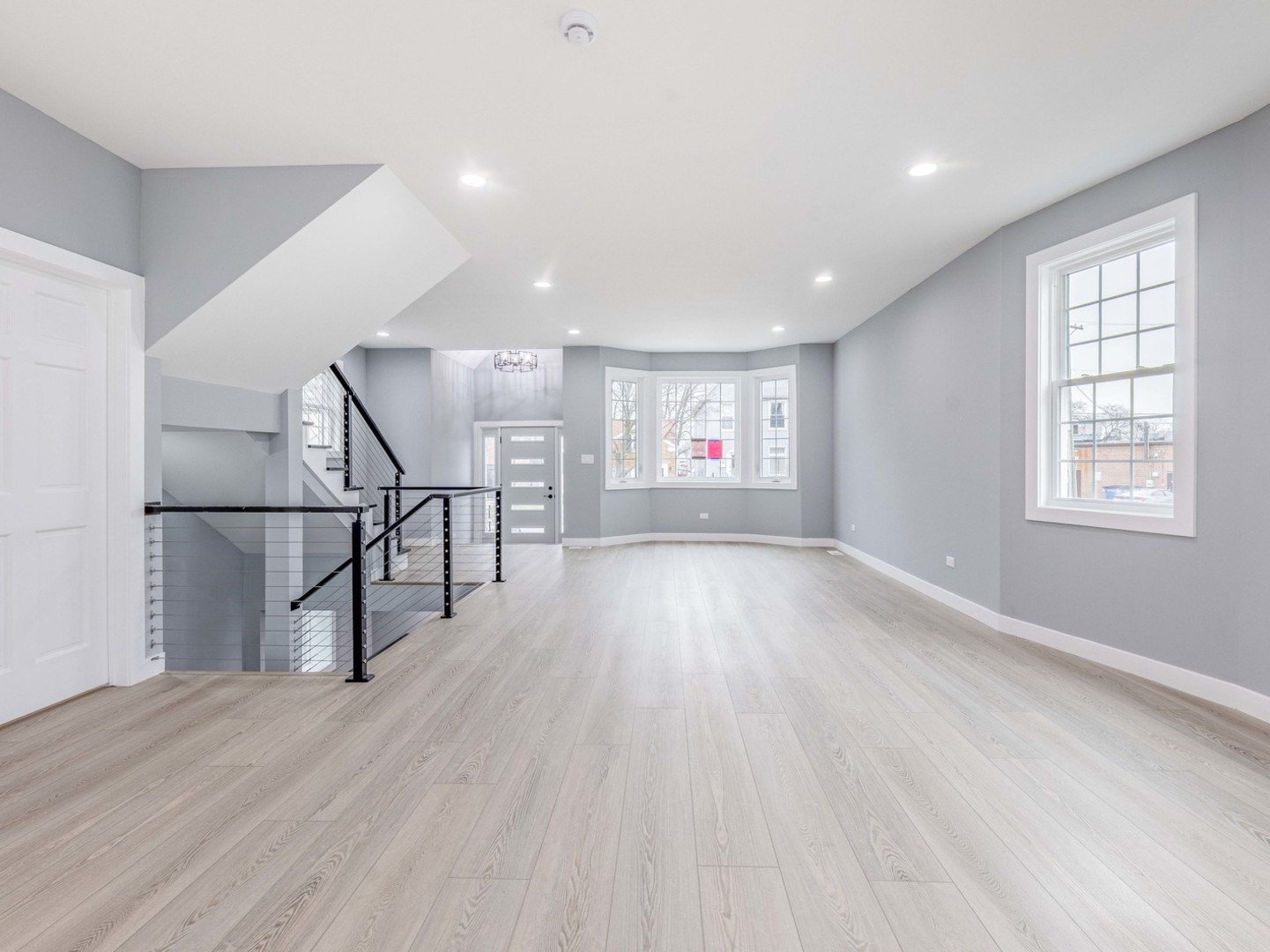 3548 Clinton Avenue Berwyn, IL 60402 - Photo 8 of 49 a view of empty room with wooden floor and fan