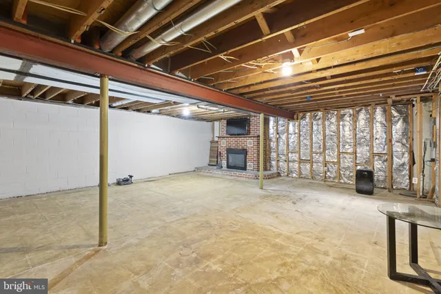 a living room with a fireplace