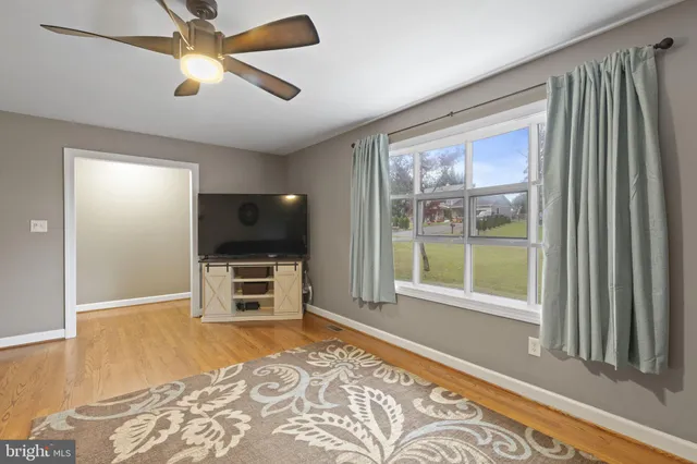 a kitchen with stainless steel appliances granite countertop a refrigerator a stove a sink and a granite counter tops