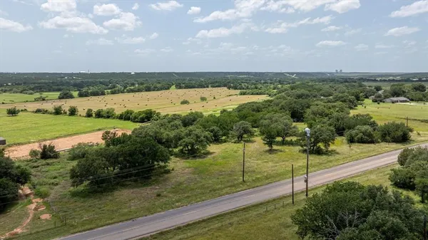 a view of a lake with a big yard