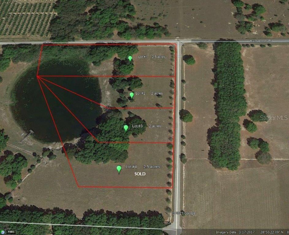 Tbd Lake Burns Road Umatilla, FL 32784 - Photo 2 of 4 an aerial view of residential house with outdoor space
