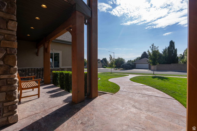 687 South 2080th Street East Springville, UT 84663 - Photo 123 of 149 Covered front porch featuring robust stone pillars and wood-finish beams