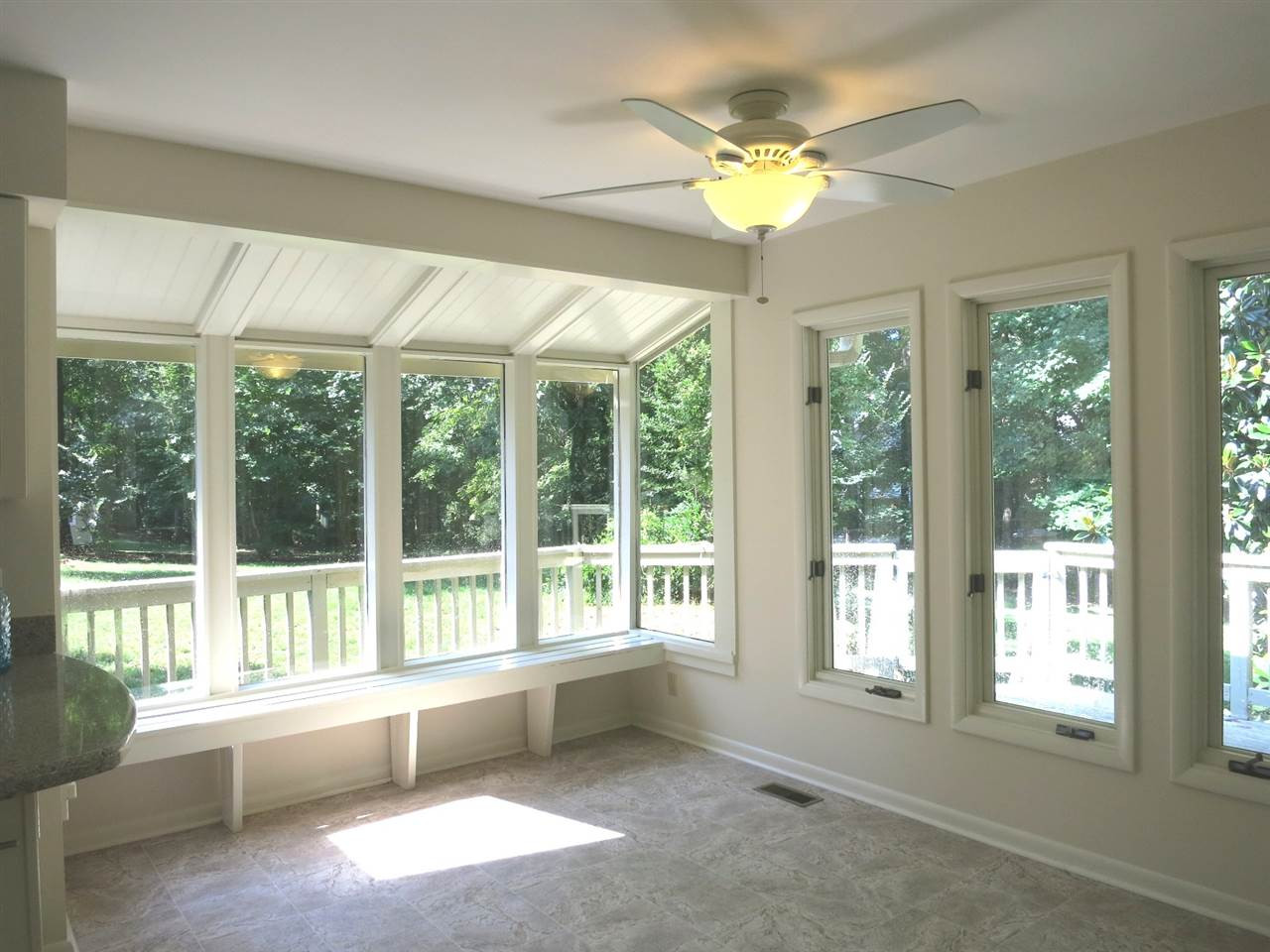 9209 Litchford Road Raleigh, NC 27615 - Photo 14 of 25 View of the lg sunny Bfast area w/3 walls of windows, built-in seating & sliders to the Sun Rm. Breakfast Area