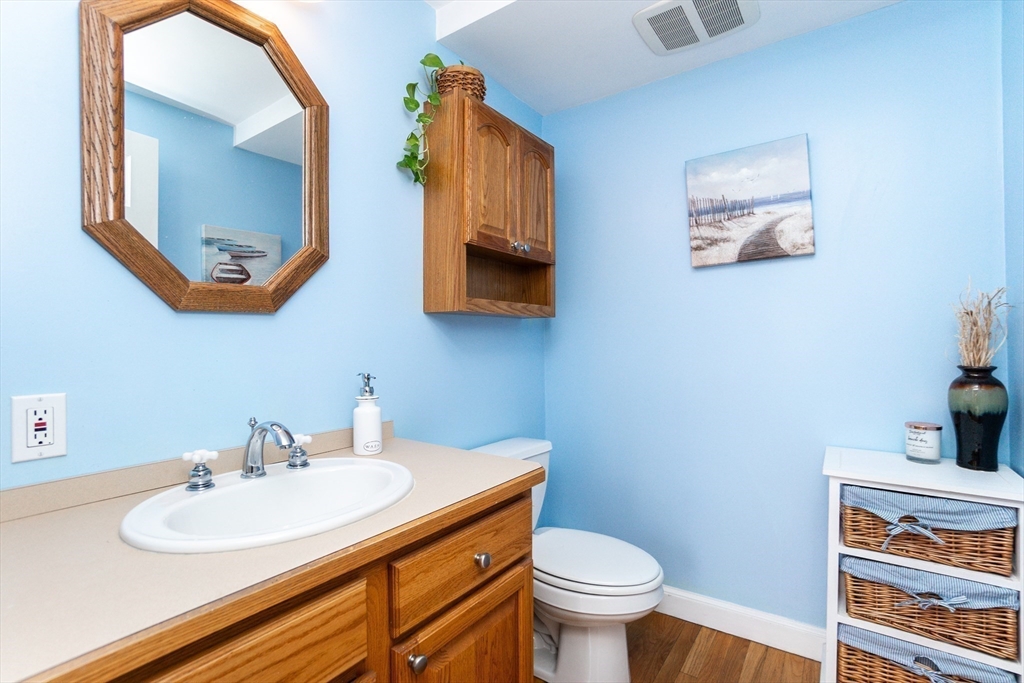 35 Hamilton Road Waltham, MA 02453 - Photo 15 of 38 a bathroom with a sink and a mirror