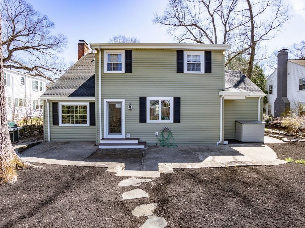 35 Hamilton Road Waltham, MA 02453 - Photo 30 of 38 a front view of a house with a yard