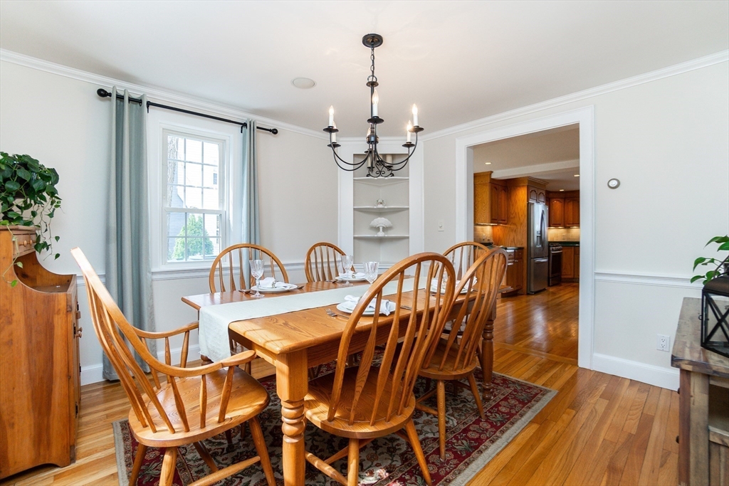 35 Hamilton Road Waltham, MA 02453 - Photo 9 of 38 a view of a dining room with furniture window and wooden floor