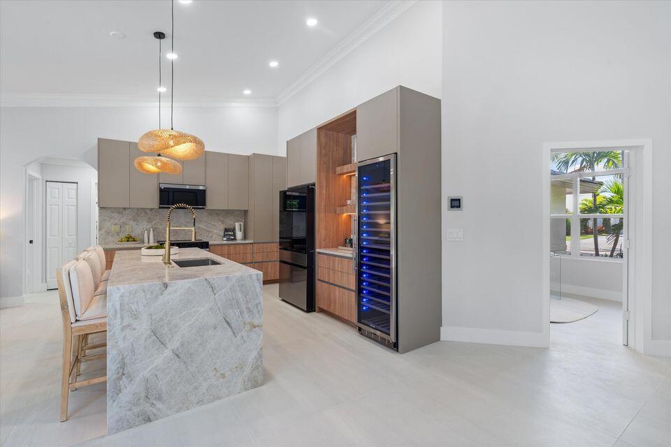 1132 Northeast 3rd Avenue Boca Raton, FL 33432 - Photo 9 of 25 a view of kitchen with furniture and window