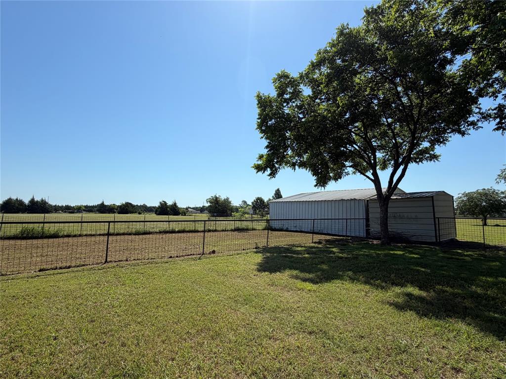 330 South Goode Road Wilmer, TX 75172 - Photo 36 of 38 a view of a garden