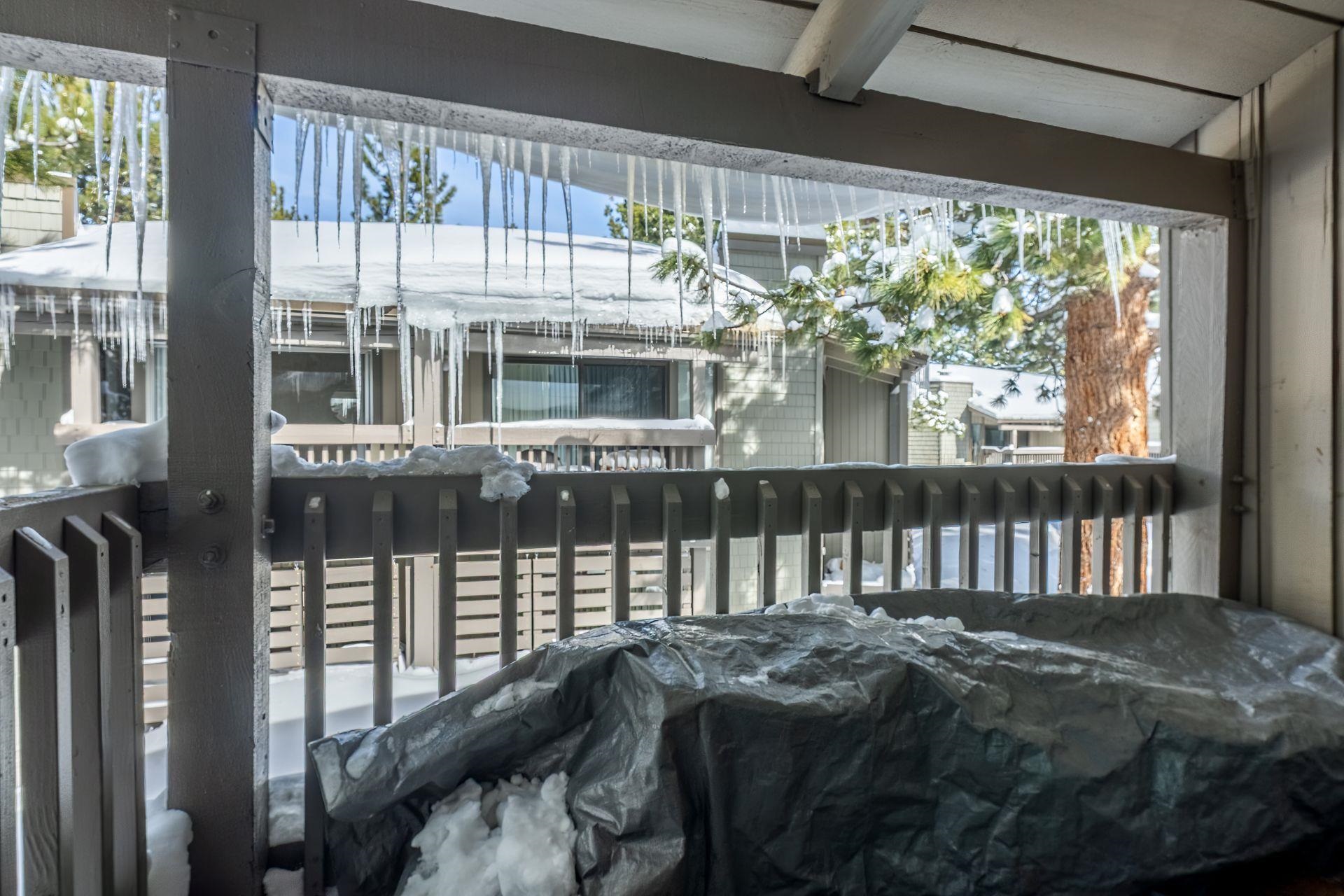 286 Old Mammoth Road, Unit 71 Mammoth Lakes, CA 93546 - Photo 22 of 24 a porch with a bench next to a window