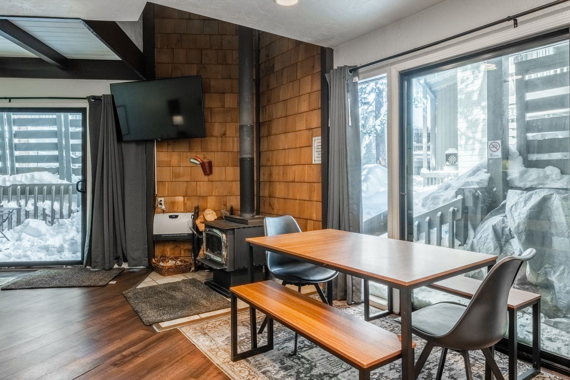286 Old Mammoth Road, Unit 71 Mammoth Lakes, CA 93546 - Photo 7 of 24 a view of a dining room with furniture window and outside view
