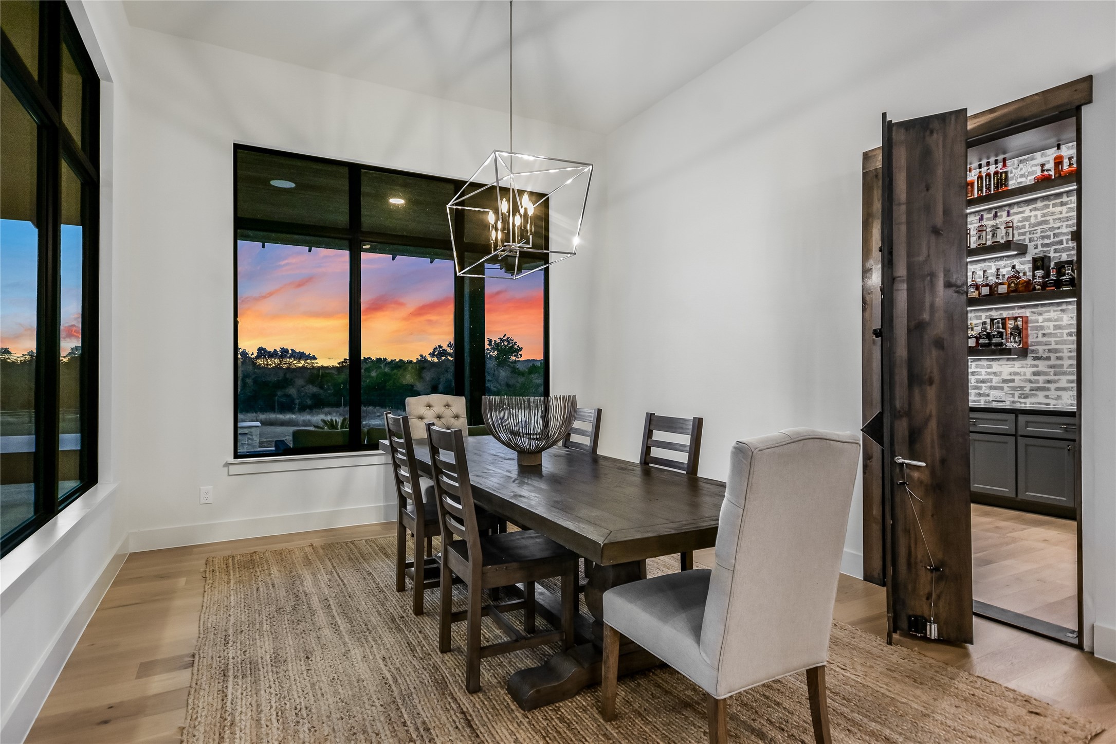 207 Gwendolyns Trail Wimberley, TX 78676 - Photo 11 of 40 a view of a dining room with furniture window and outside view