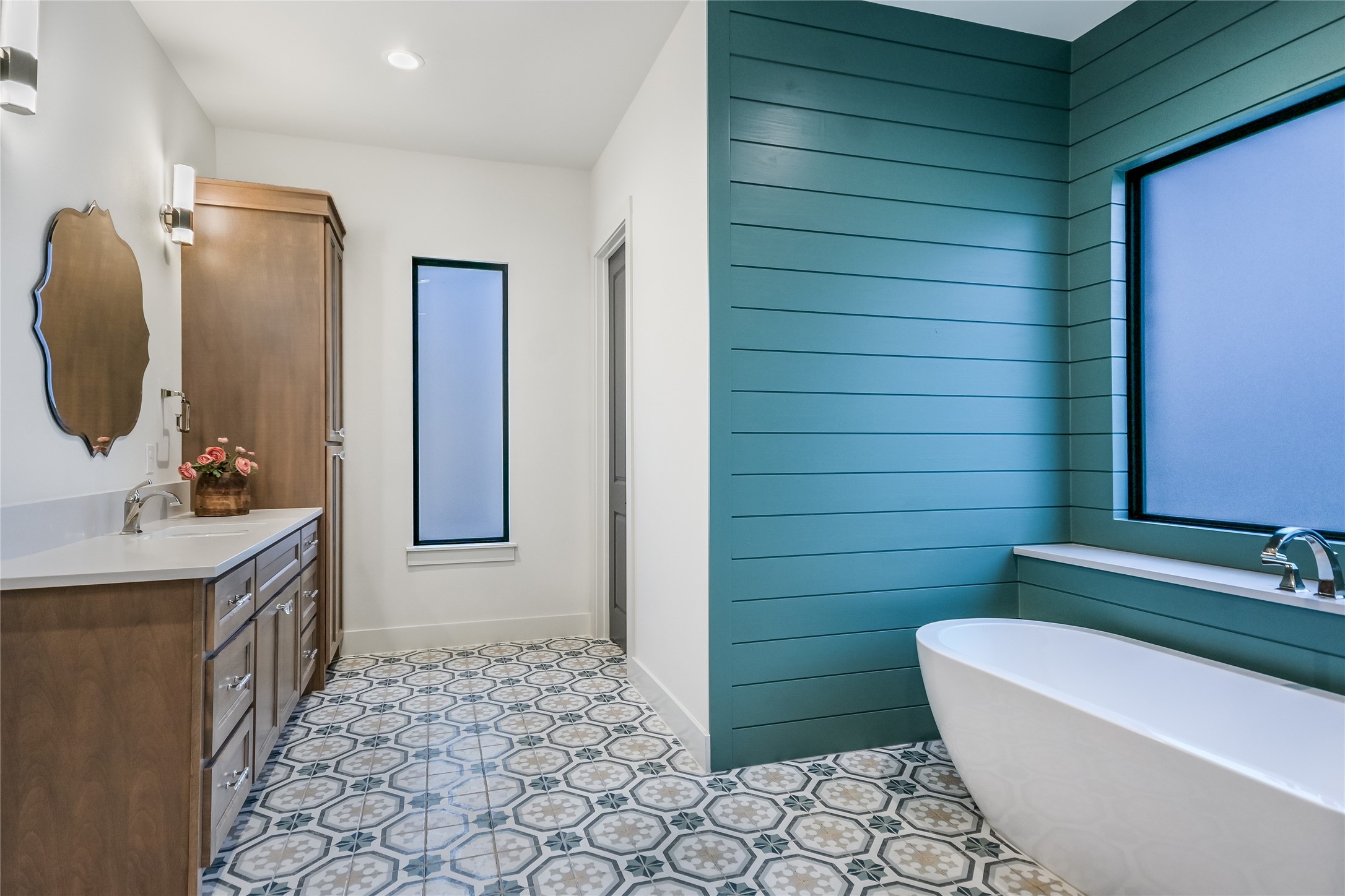 207 Gwendolyns Trail Wimberley, TX 78676 - Photo 23 of 40 a bathroom with a sink a toilet and shower