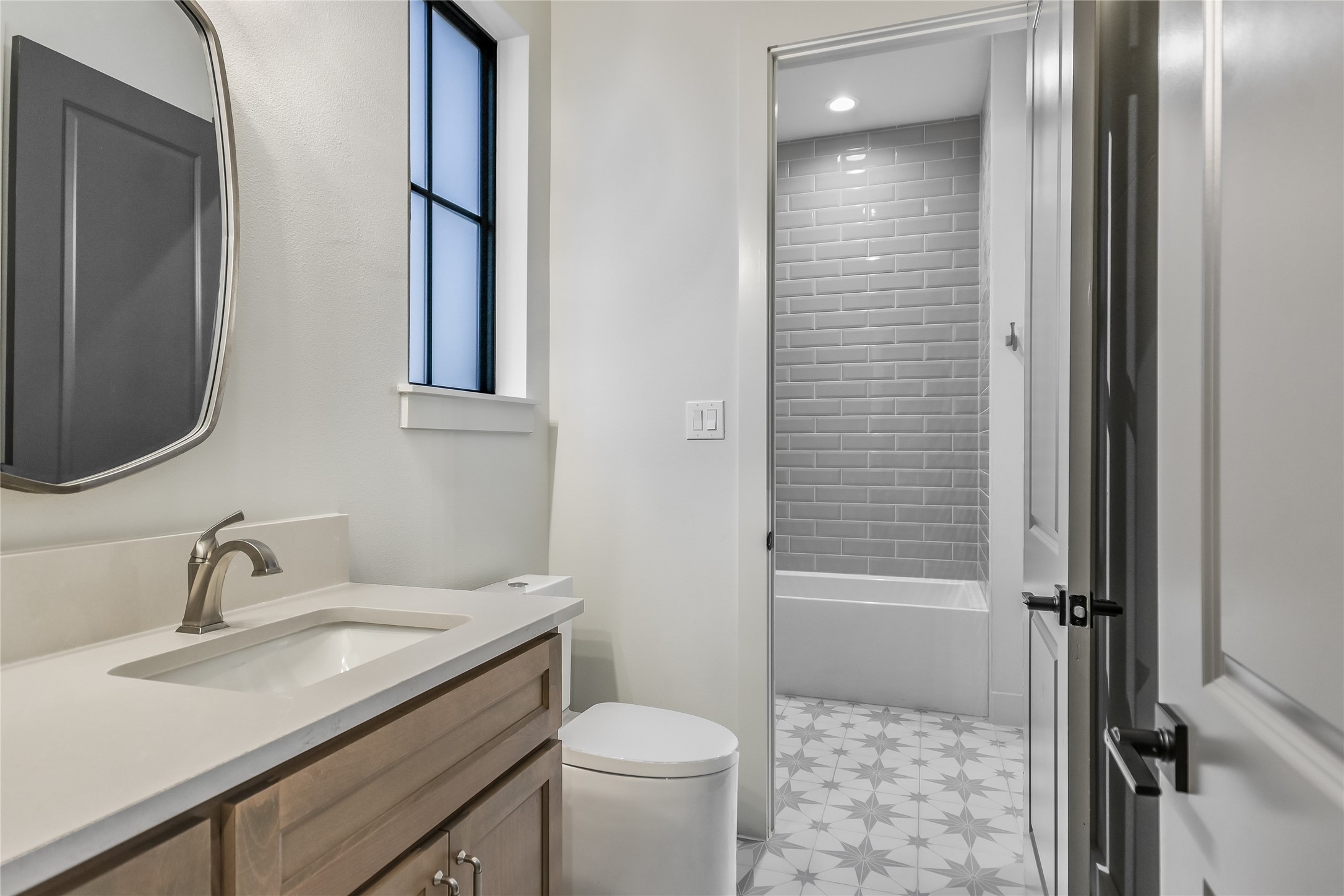 207 Gwendolyns Trail Wimberley, TX 78676 - Photo 32 of 40 a bathroom with a sink toilet and shower