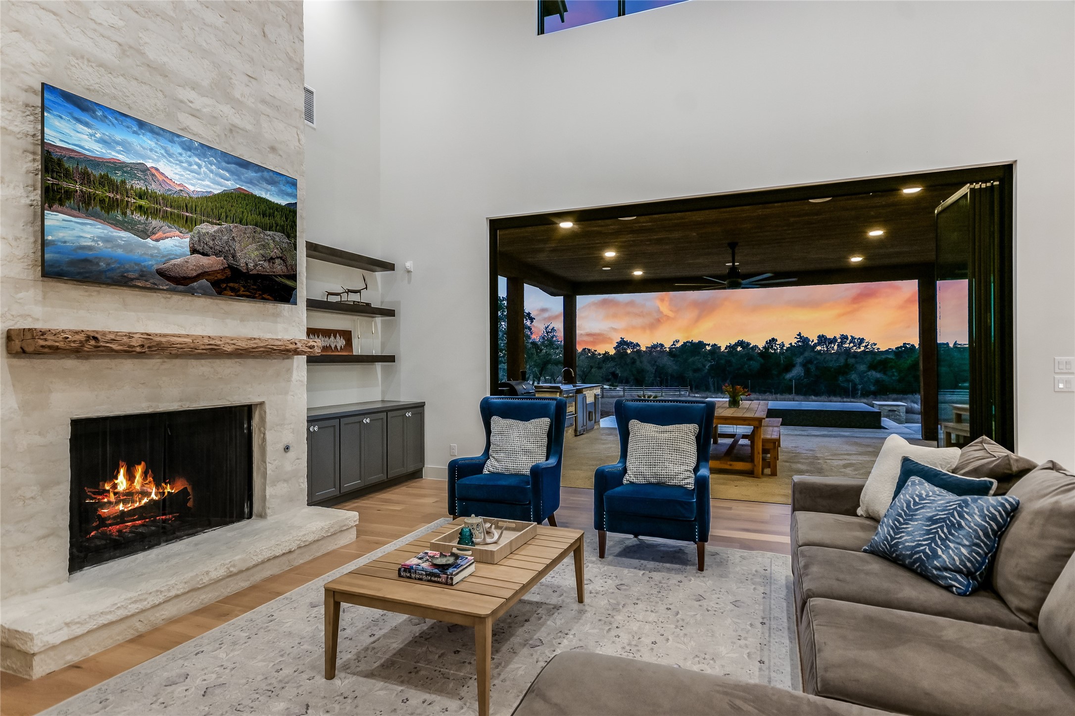 207 Gwendolyns Trail Wimberley, TX 78676 - Photo 5 of 40 a living room with furniture and a fireplace