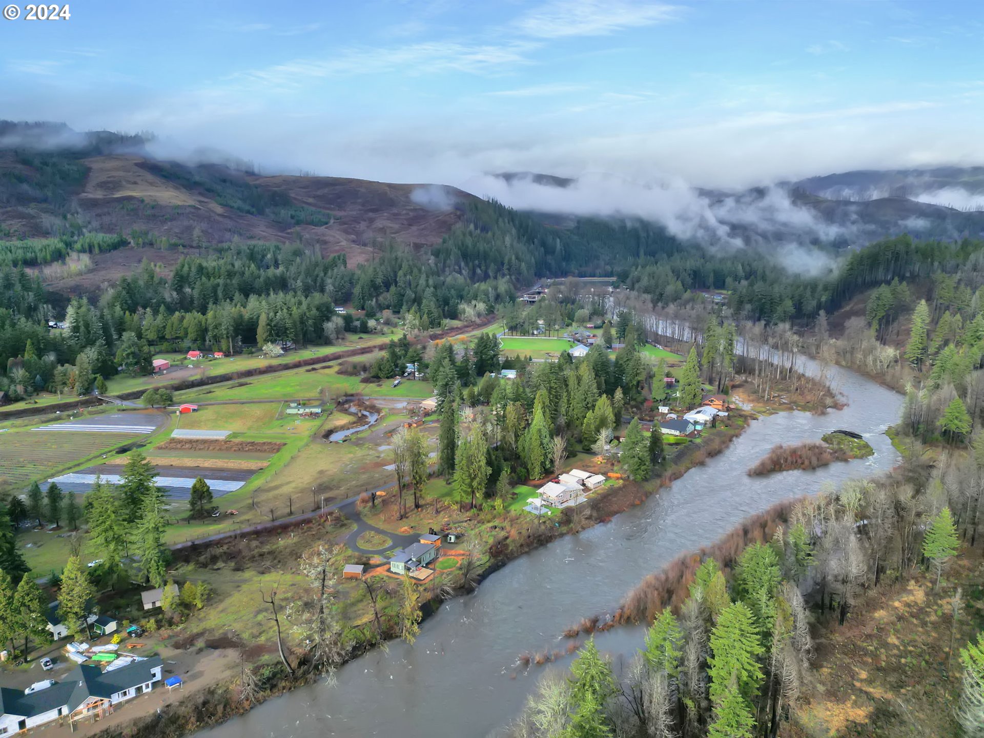 90409 Mountain View Lane Leaburg, OR 97489 - Photo 11 of 18 an aerial view of a houses with a yard