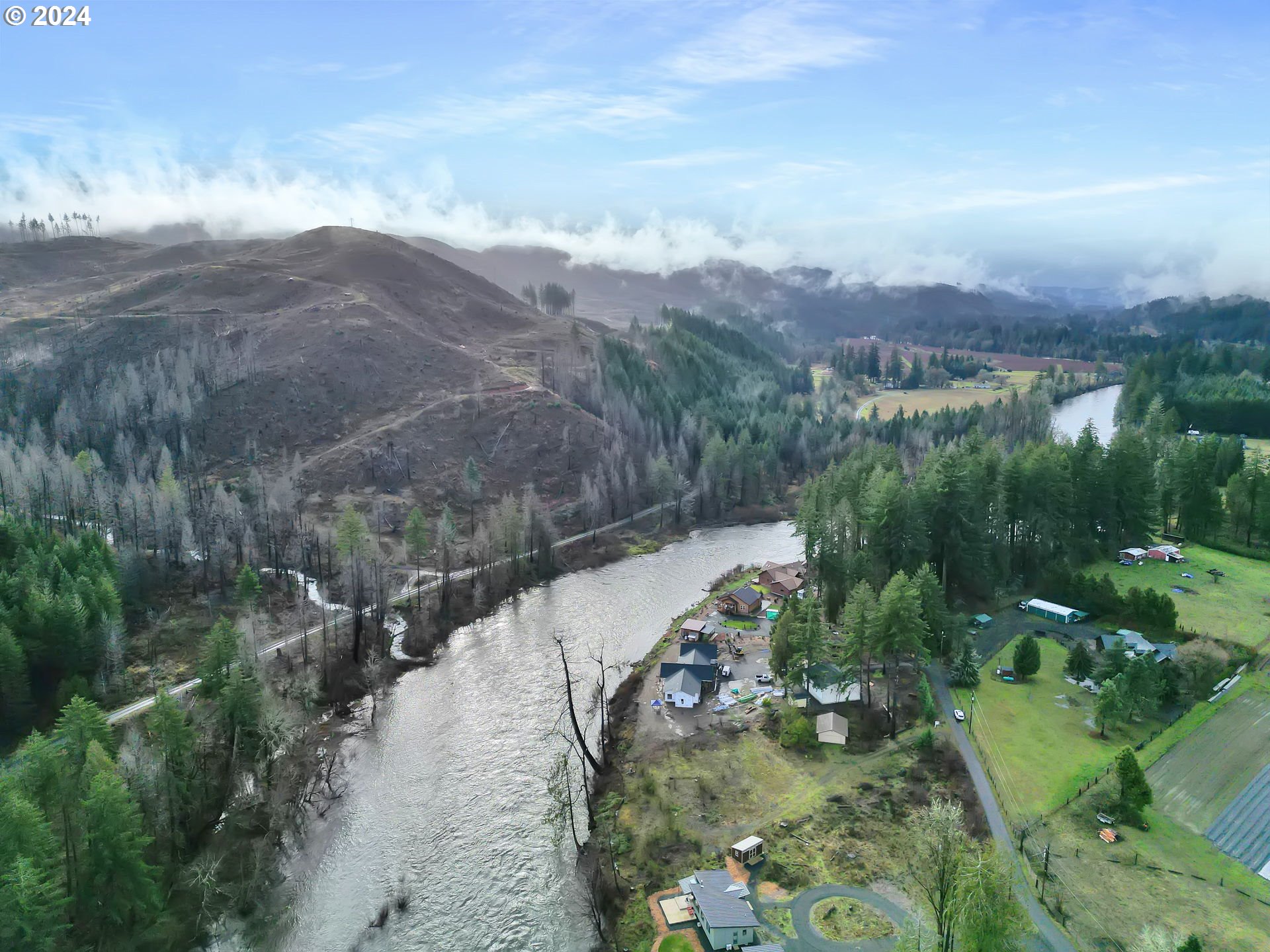 90409 Mountain View Lane Leaburg, OR 97489 - Photo 5 of 18 a view of a city with mountains in the background