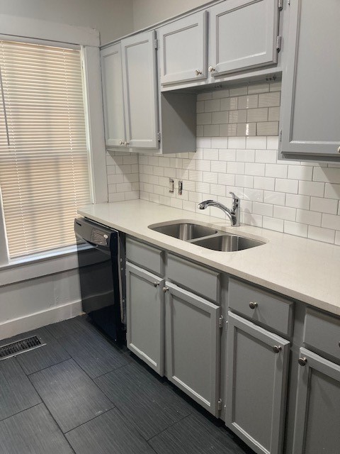2710 Whitis Avenue, Unit A Austin, TX 78705 - Photo 13 of 20 a kitchen with a sink cabinets and window