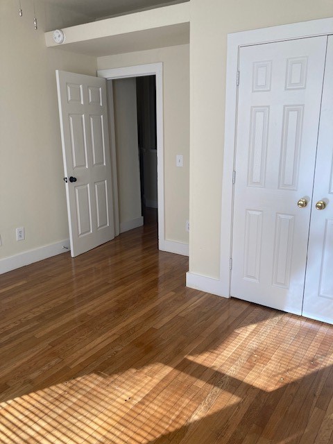 2710 Whitis Avenue, Unit A Austin, TX 78705 - Photo 7 of 20 a view of an empty room with wooden floor