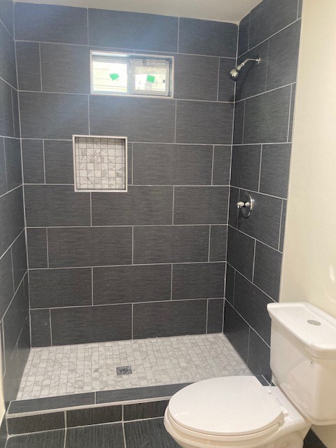 2710 Whitis Avenue, Unit A Austin, TX 78705 - Photo 8 of 20 a bathroom with a toilet and a sink