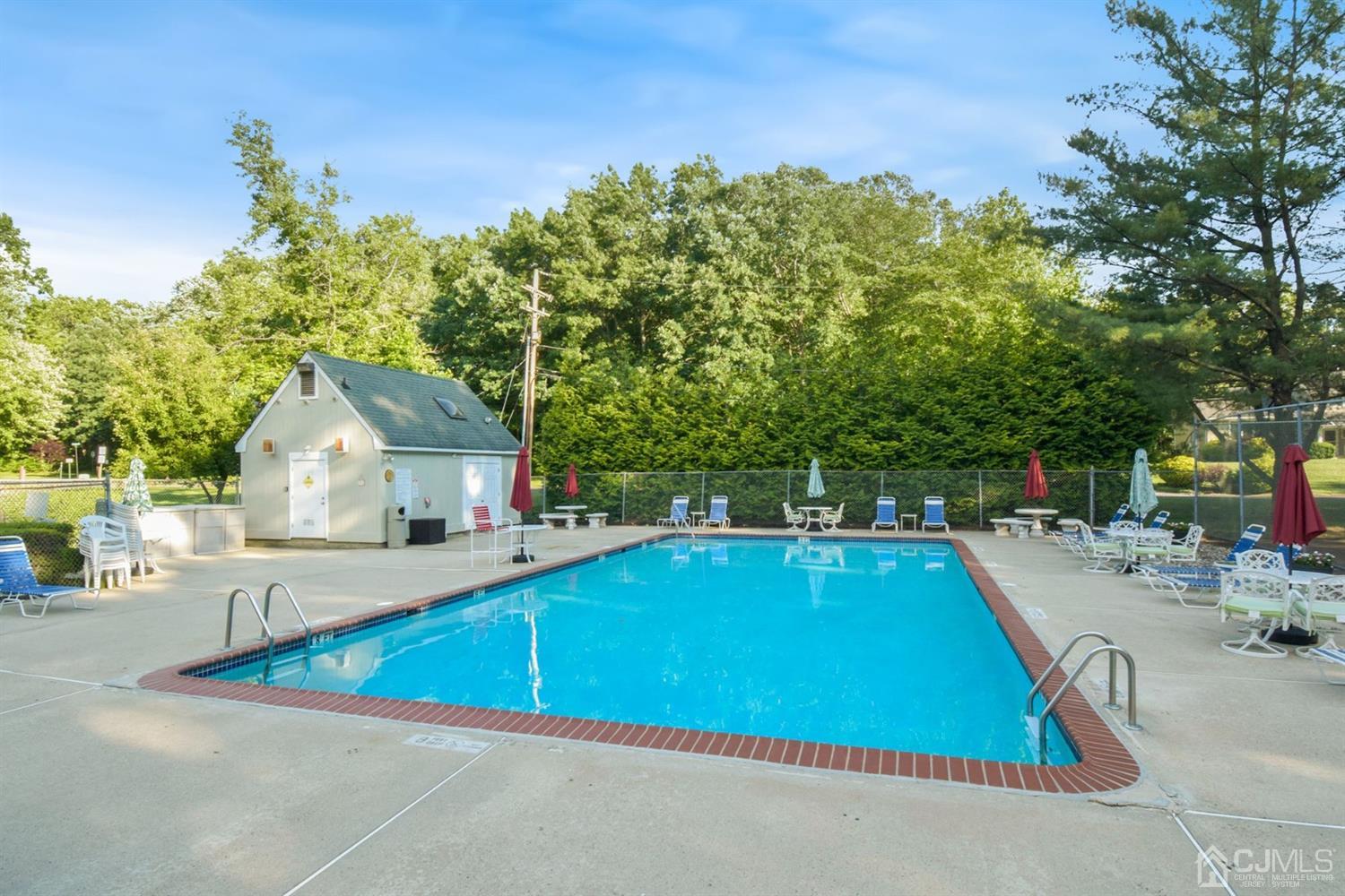 119 Redpine Loop Old Bridge, NJ 08857 - Photo 12 of 15 a view of a house with swimming pool and sitting area