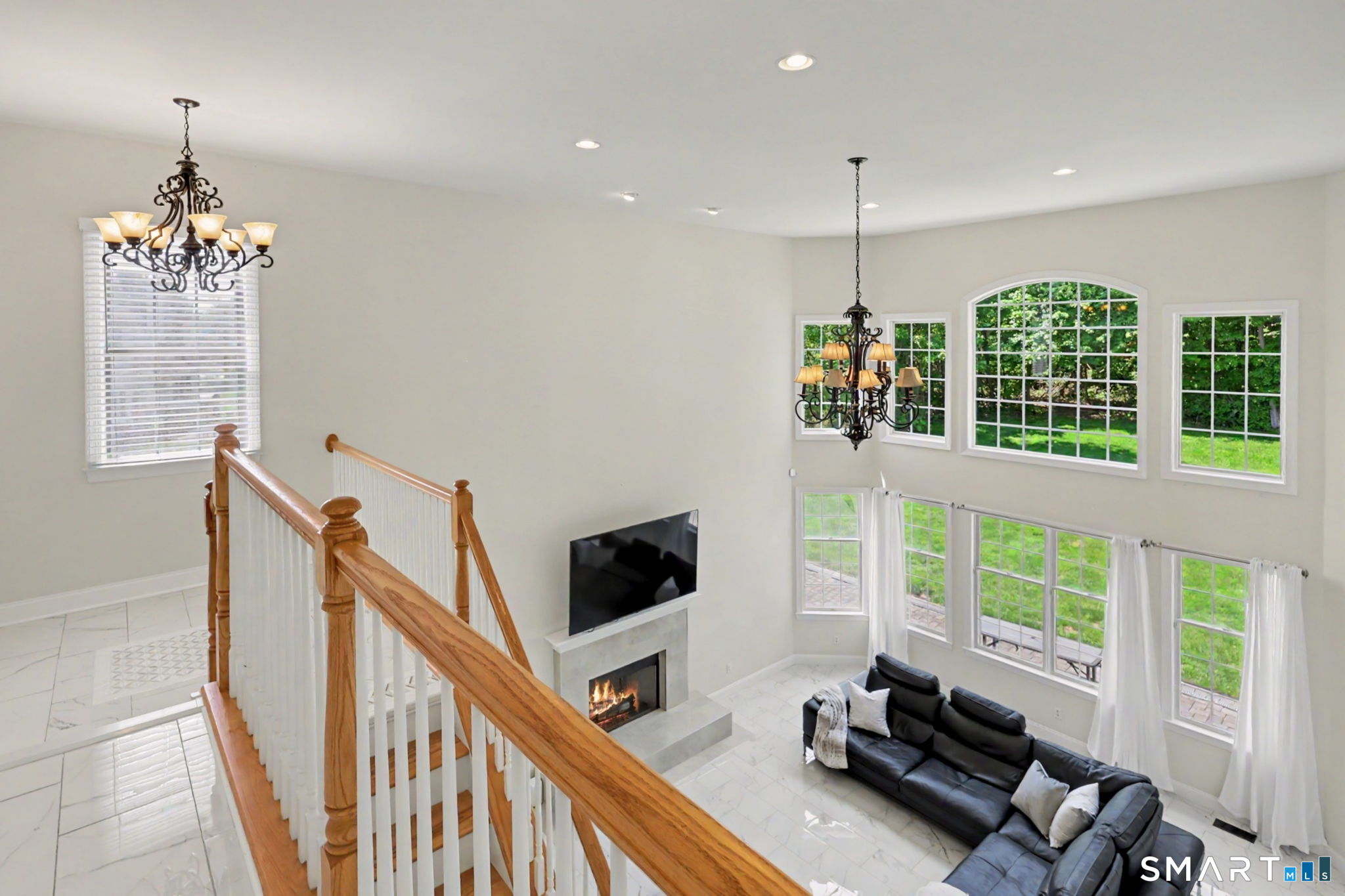 60 Wabuda Place Shelton, CT 06484 - Photo 24 of 40 Standing on upperstaircase looking to the great room