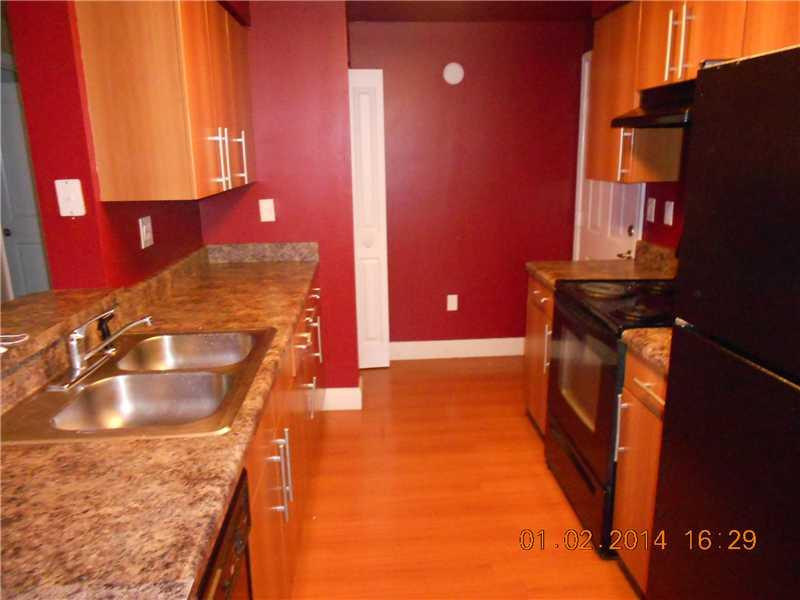 5860 West Sample Road, Unit 1054 Coral Springs, FL 33067 - Photo 3 of 5 Kitchen