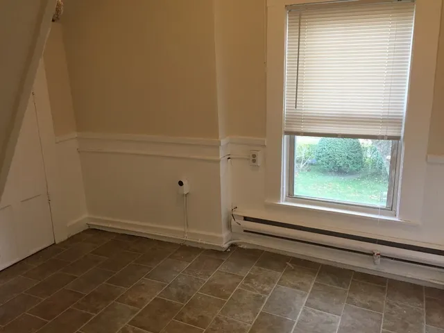 a view of a window in an empty room