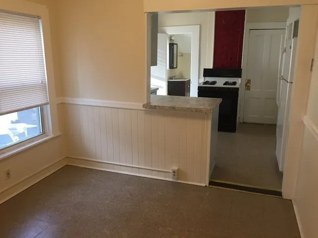 a view of kitchen and utility room
