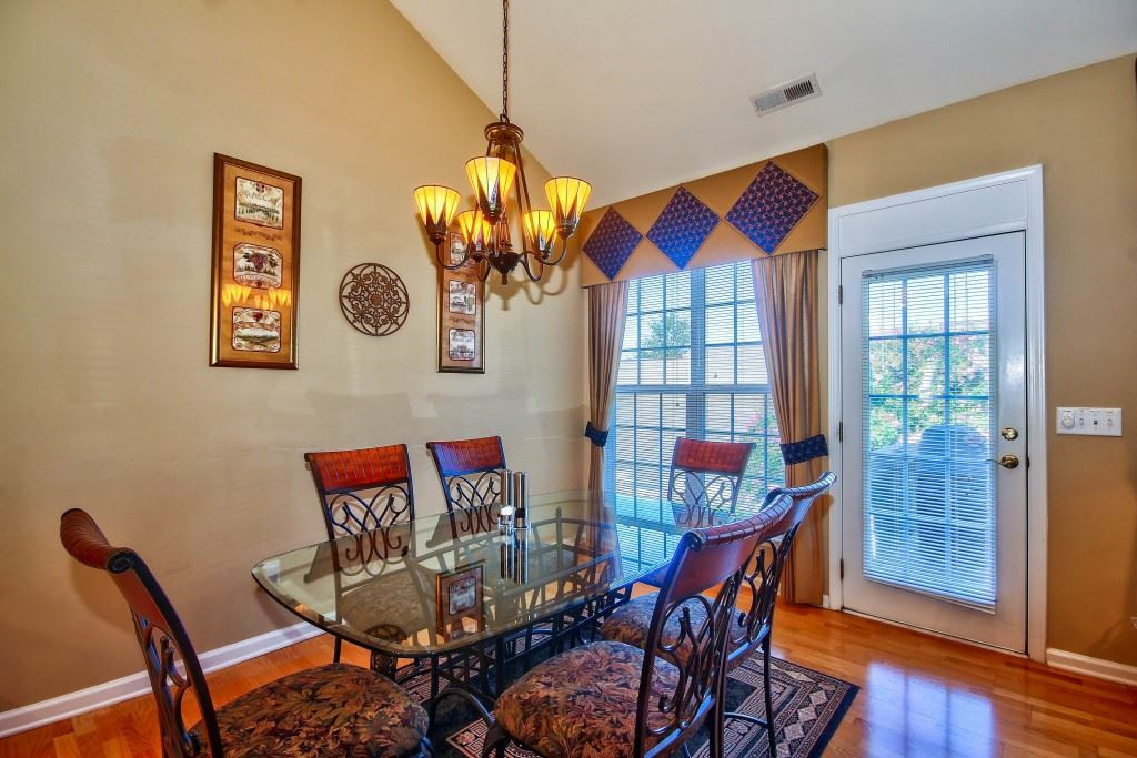 7725 Monte Alto Drive Raleigh, NC 27613 - Photo 10 of 25 Large space that flows easily from the kitchen makes it easy to serve friends and family. Breakfast Room
