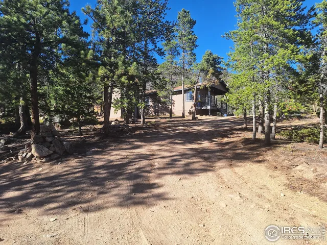 a view of road with trees