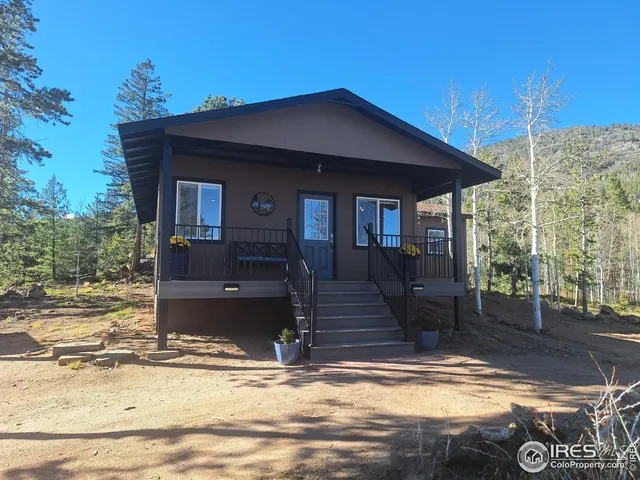 a view of a house with swimming pool