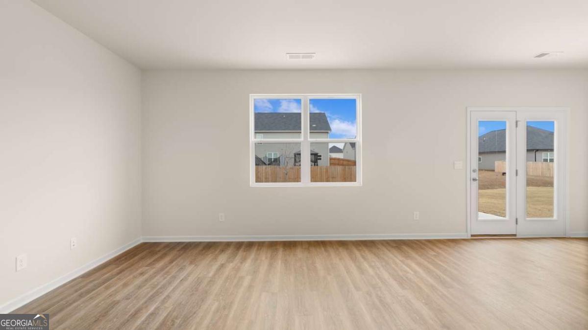 202 Cattle Drive Perry, GA 31069 - Photo 19 of 30 a view of an empty room with a window