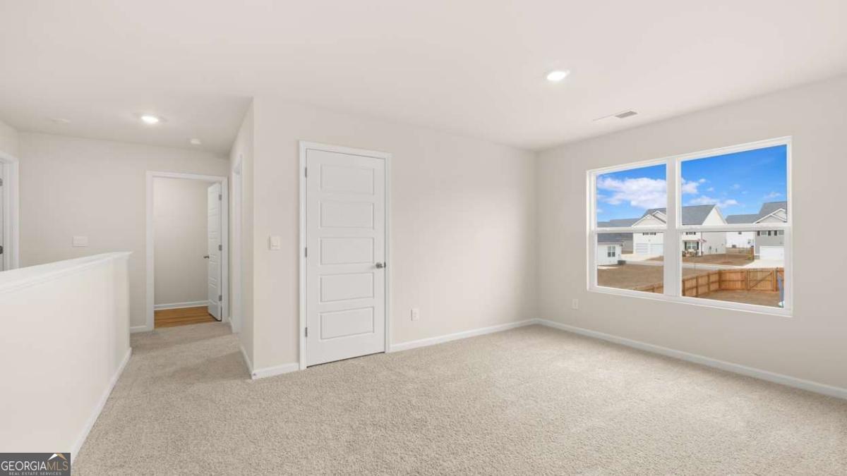 202 Cattle Drive Perry, GA 31069 - Photo 23 of 30 a view of an empty room with a window